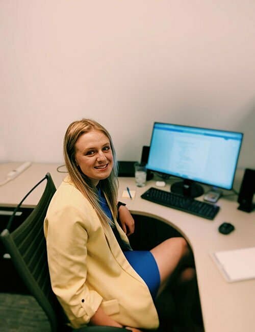 Emma working in office