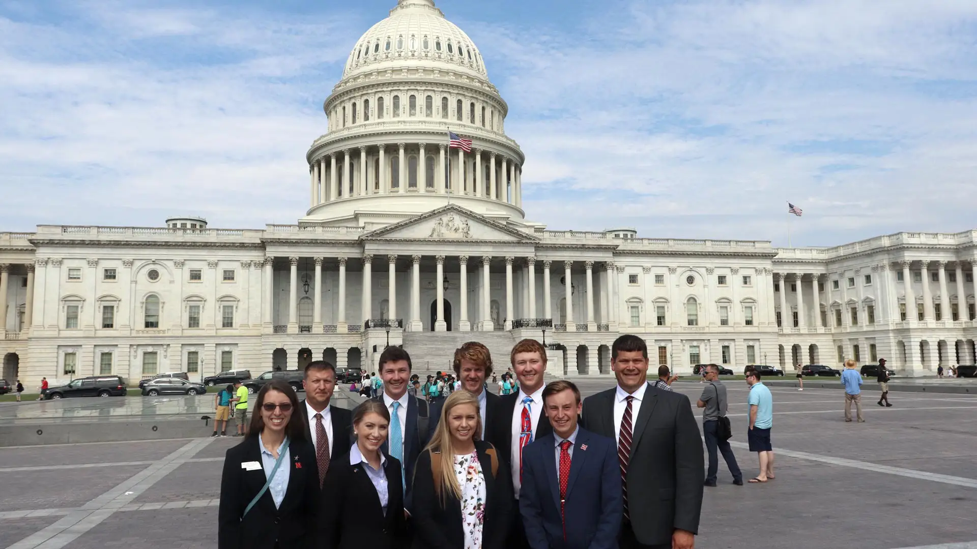 Nebraska Corn interns standing in front of the capital