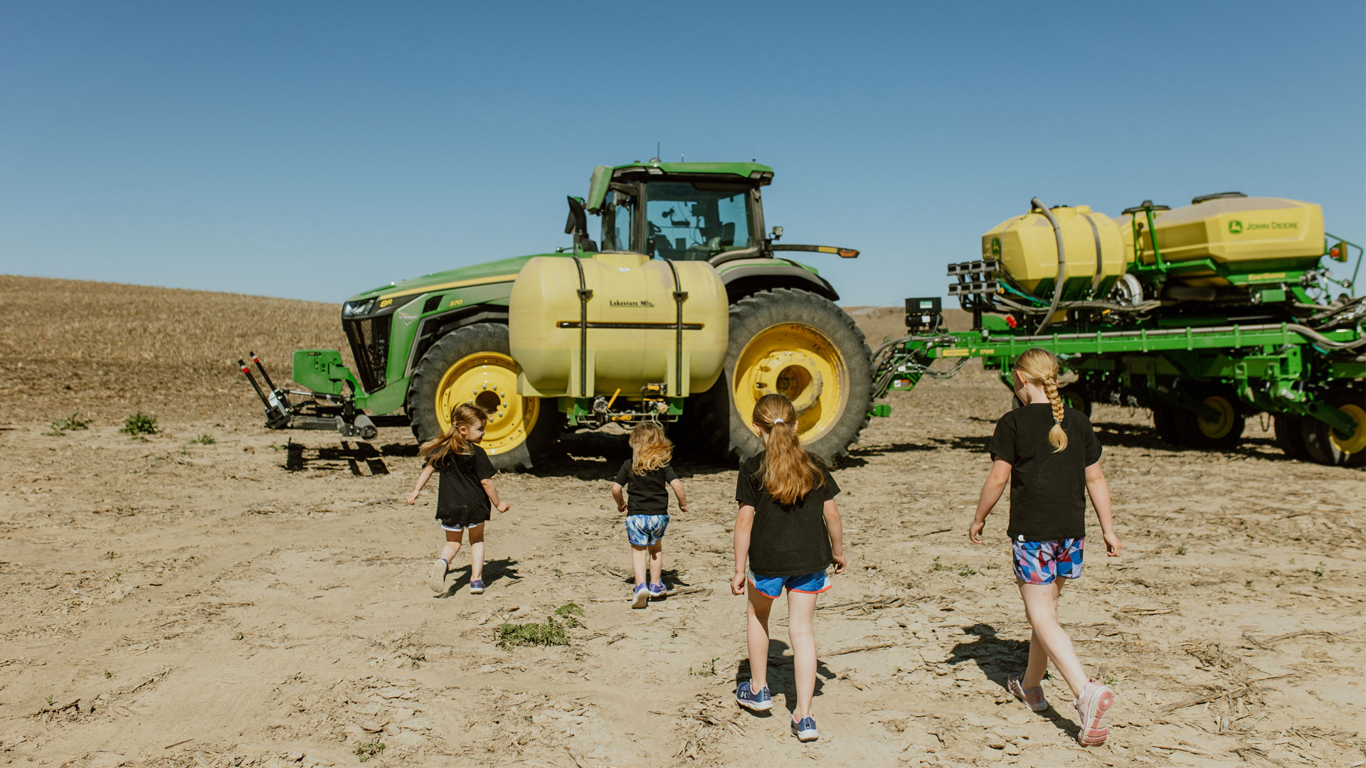 Kids walking to tractor